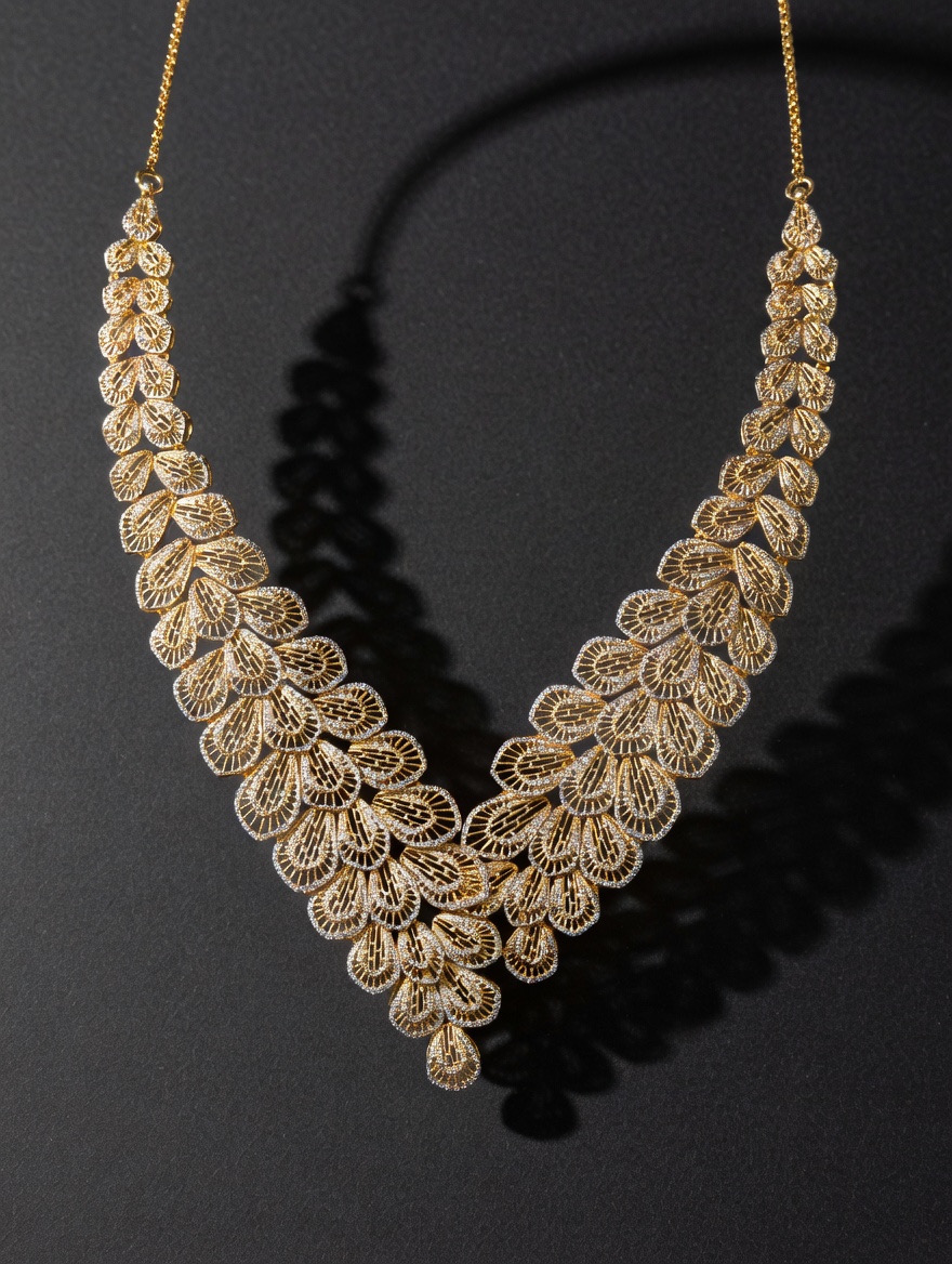 The Gold Leaf Queen 22K gold fan petal V necklace flat lay full silhouette by Mari Jewellers Chilaw Sri Lanka