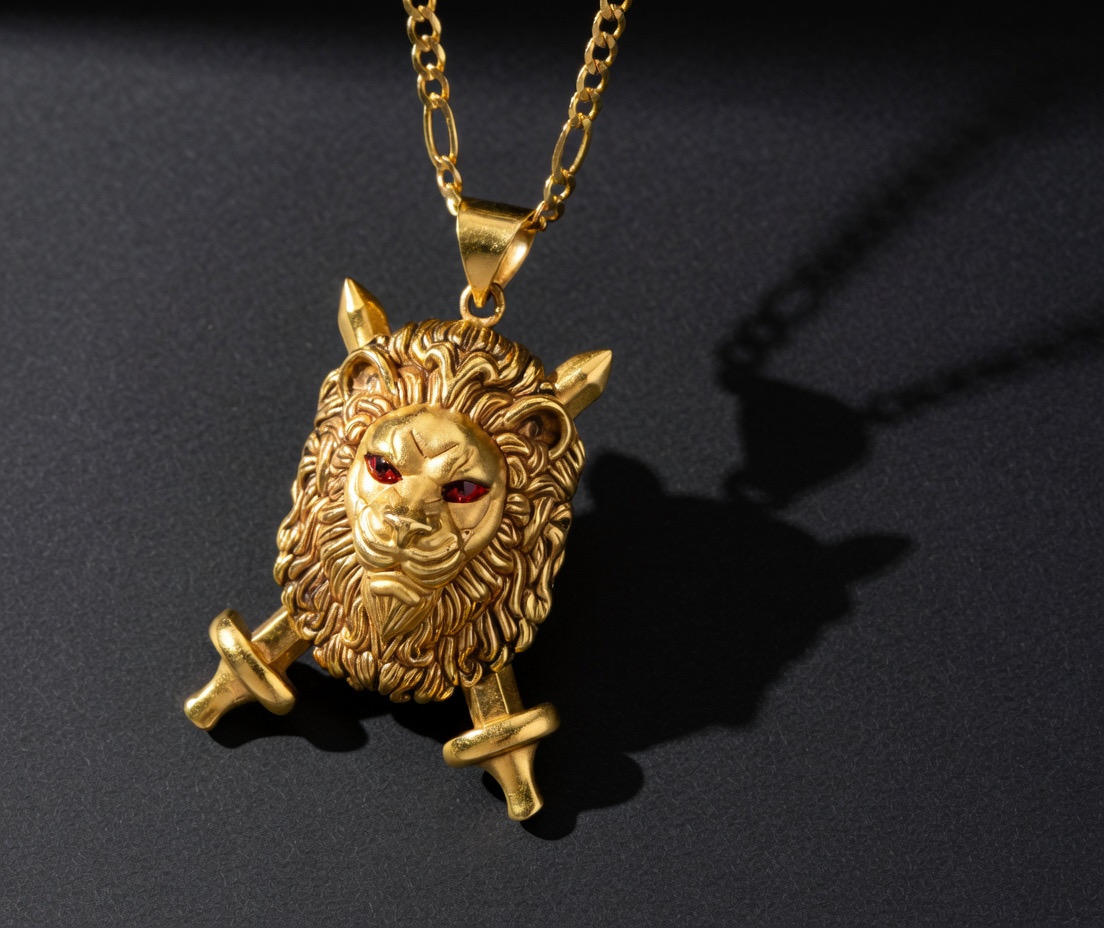 22K electroformed gold lion head crossed swords pendant ruby eyes Figaro chain by Mari Jewellers Chilaw Sri Lanka
